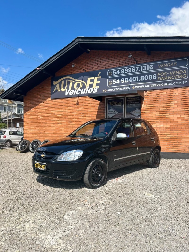 celta 1.0 mpfi ls 8v flex 4p manual 2010 canela