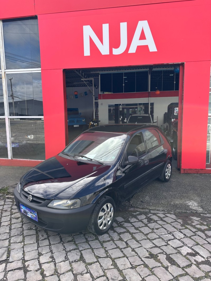 celta 1.0 mpfi vhc 8v gasolina 4p manual 2004 caxias do sul