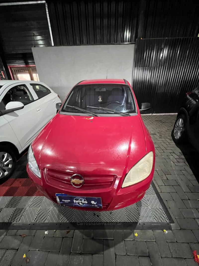celta 1.0 mpfi life 8v flex 4p manual 2010 canela
