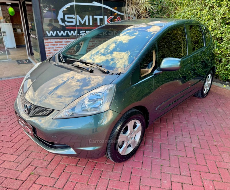 fit 1.4 lxl 8v flex 4p manual 2009 rolante
