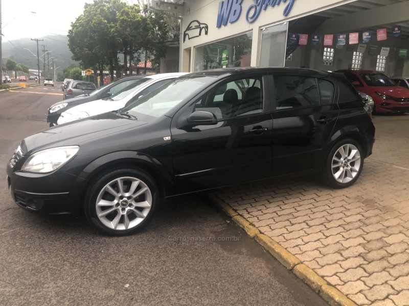 vectra 2.0 mpfi gt x hatch 8v flex 4p automatico 2009 vale real