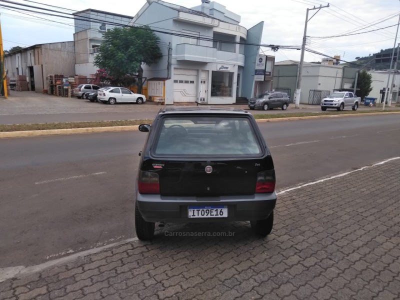 UNO 1.0 MPI MILLE WAY ECONOMY 8V FLEX 4P MANUAL - 2013 - GUAPORé