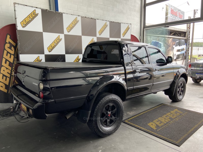 L200 OUTDOOR 2.5 HPE 4X4 CD 8V TURBO INTERCOOLER DIESEL 4P MANUAL - 2010 - PORTãO