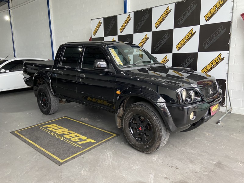 L200 OUTDOOR 2.5 HPE 4X4 CD 8V TURBO INTERCOOLER DIESEL 4P MANUAL - 2010 - PORTãO