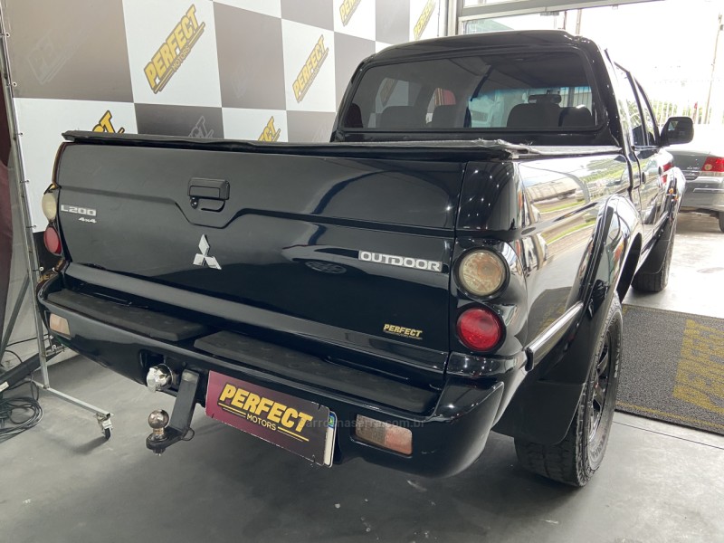 L200 OUTDOOR 2.5 HPE 4X4 CD 8V TURBO INTERCOOLER DIESEL 4P MANUAL - 2010 - PORTãO