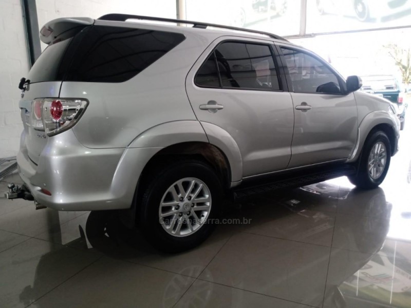 HILUX SW4 3.0 SRV 4X4 7 LUGARES 16V TURBO INTERCOOLER DIESEL 4P AUTOMÁTICO - 2014 - CAXIAS DO SUL