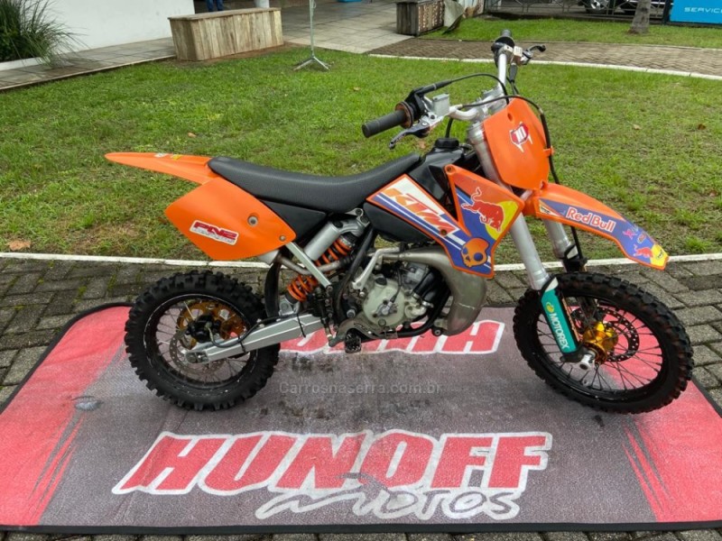 sx 65 gasolina 2008 feliz