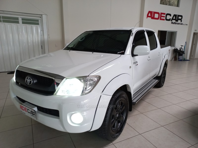 HILUX 2.5 4X4 CD 16V TURBO DIESEL 4P MANUAL - 2011 - FARROUPILHA