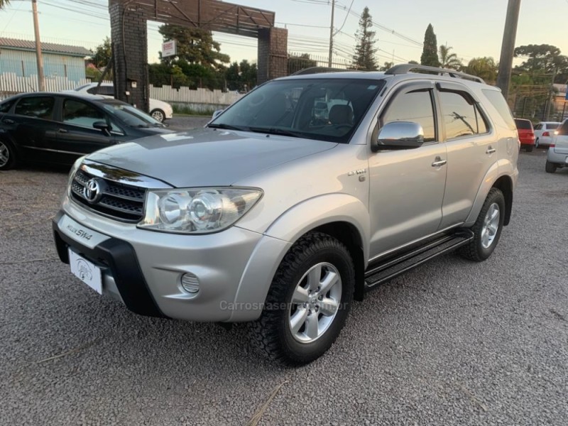 hilux sw4 2.7 srv 4x2 16v flex 7 lugares 4p automatico 2010 caxias do sul