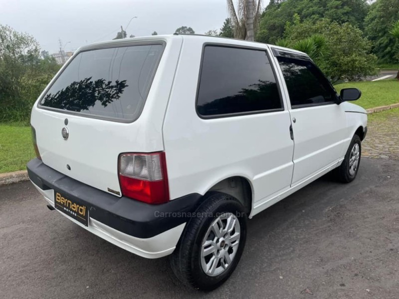 UNO 1.0 MPI MILLE FIRE ECONOMY 8V FLEX 2P MANUAL - 2010 - CAMPO BOM