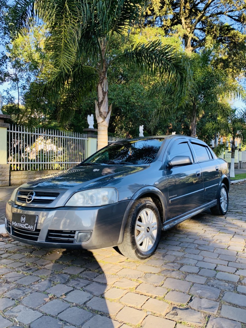 astra 2.0 mpfi elite sedan 8v flex 4p manual 2005 canela