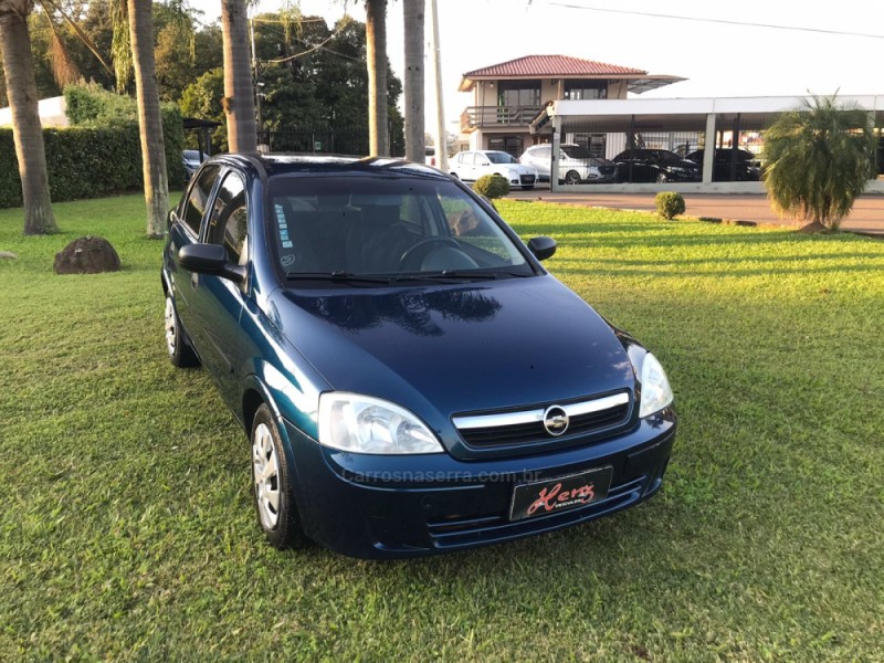 corsa 1.0 mpfi joy sedan 8v flex 4p manual 2003 bom principio