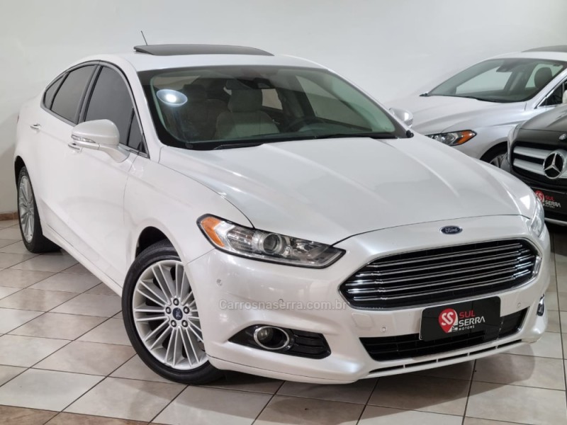 FUSION 2.0 TITANIUM PLUS AWD 16V GASOLINA 4P AUTOMÁTICO