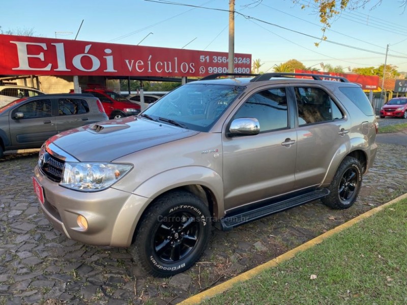 hilux sw4 3.0 srv 4x4 7 lugares 16v turbo intercooler diesel 4p automatico 2009 dois irmaos