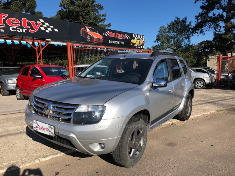 DUSTER 1.6 TECH ROAD 4X2 16V FLEX 4P MANUAL - 2014 - CANELA