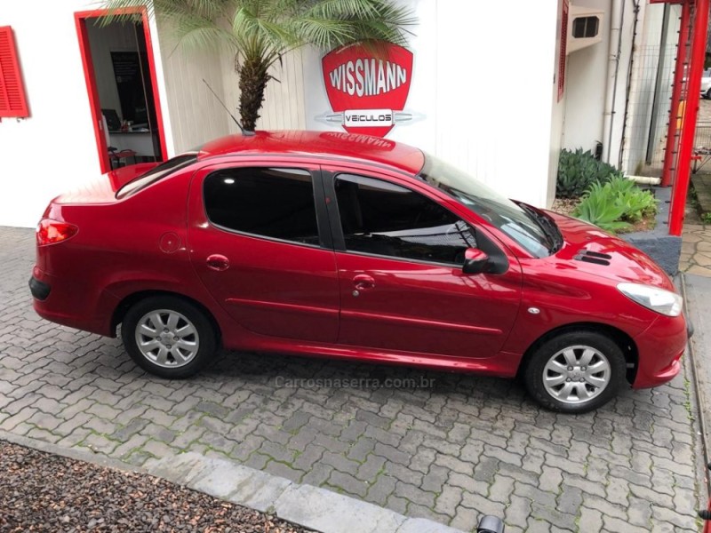 207 1.4 SEDAN XR PASSION 8V FLEX 4P MANUAL - 2011 - TRêS COROAS