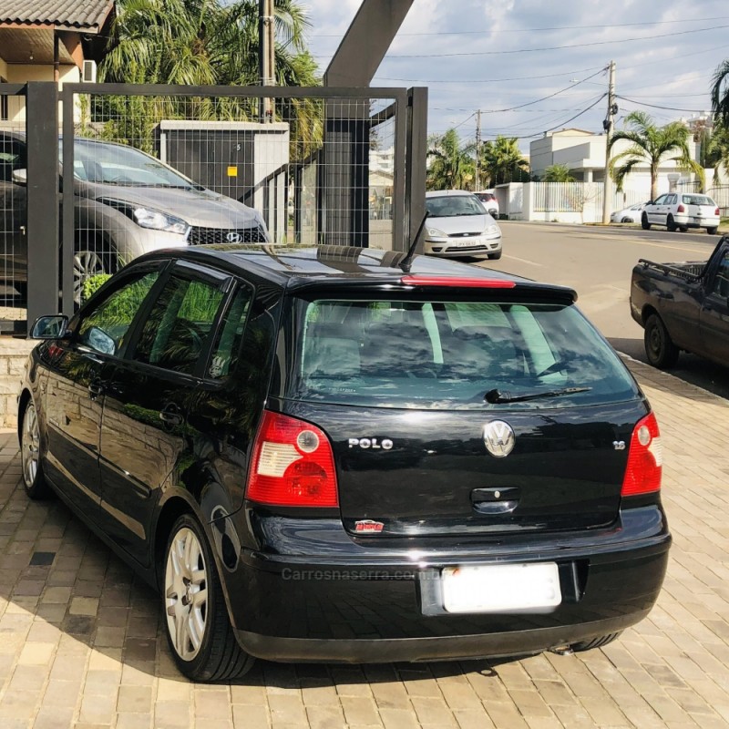 POLO 1.6 MI COMFORTLINE 8V FLEX 4P MANUAL - 2004 - GUAPORé
