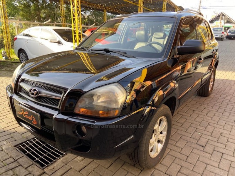 tucson 2.0 mpfi gl 16v 142cv 2wd gasolina 4p manual 2010 canela