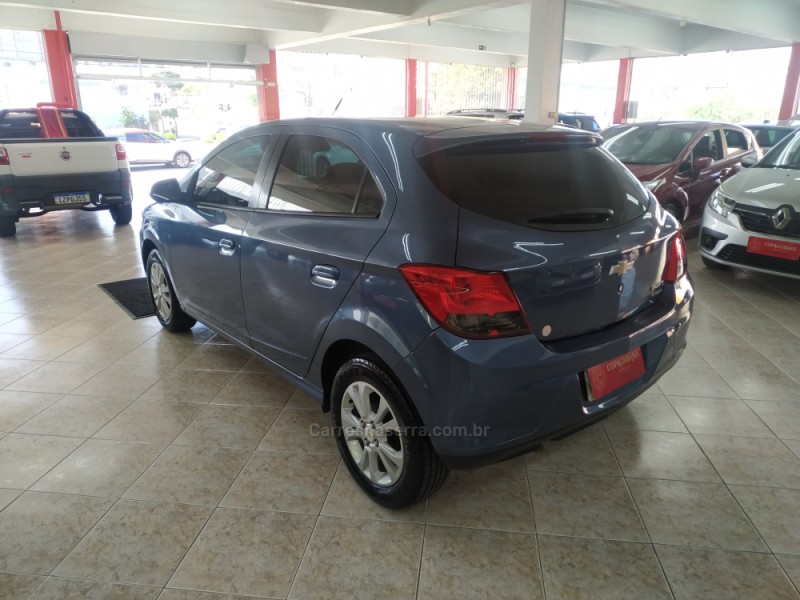 ONIX 1.0 MPFI LOLLAPALOOZA 8V FLEX 4P MANUAL - 2014 - CAXIAS DO SUL