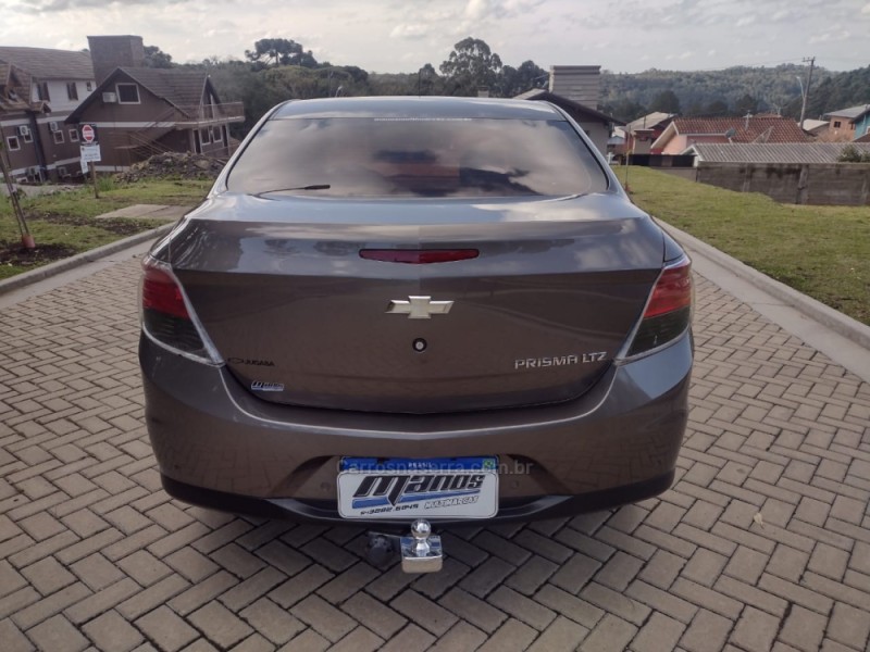 PRISMA 1.4 MPFI LTZ 8V FLEX 4P MANUAL - 2013 - CANELA