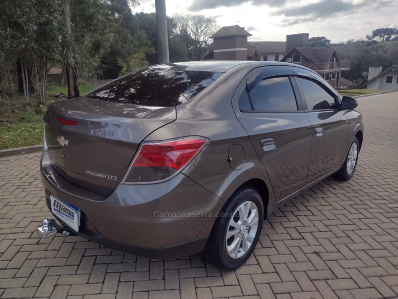 PRISMA 1.4 MPFI LTZ 8V FLEX 4P MANUAL - 2013 - CANELA