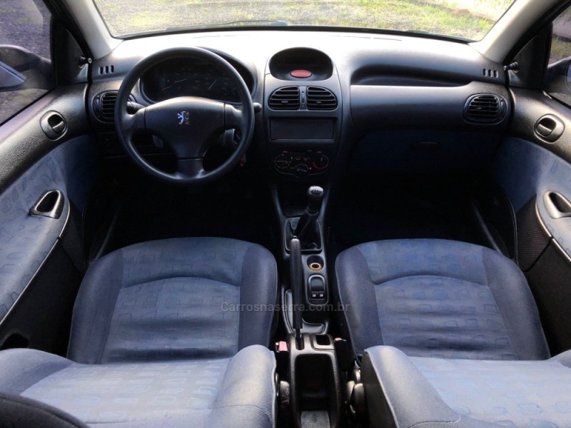 206 1.0 SOLEIL 16V GASOLINA 2P MANUAL - 2003 - PAROBé