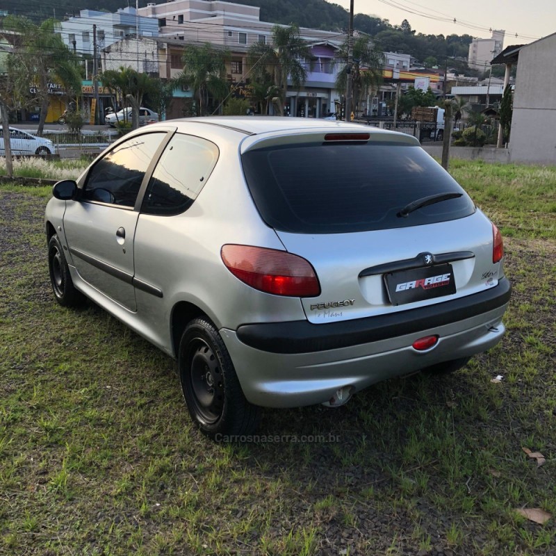 206 1.0 SOLEIL 16V GASOLINA 2P MANUAL - 2003 - PAROBé