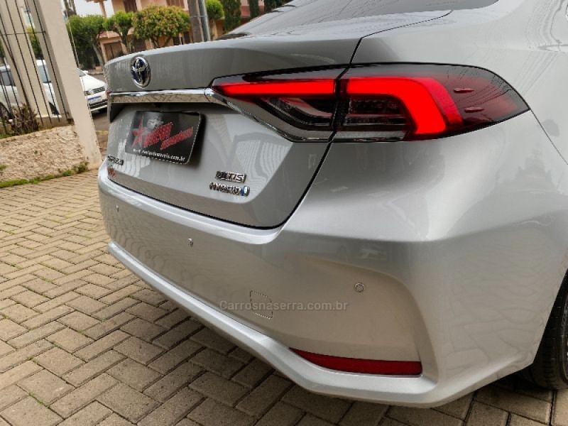COROLLA 1.8 ALTIS PREMIUM 16V HÍBRIDO 4P AUTOMÁTICO - 2021 - TEUTôNIA