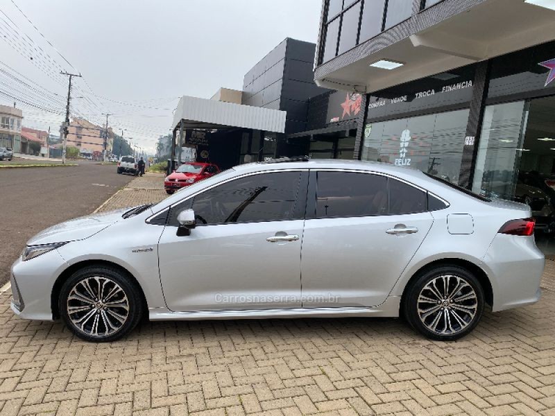 COROLLA 1.8 ALTIS PREMIUM 16V HÍBRIDO 4P AUTOMÁTICO - 2021 - TEUTôNIA