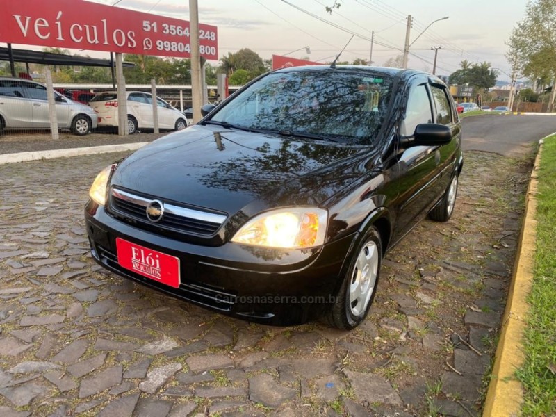 corsa 1.4 mpfi maxx 8v flex 4p manual 2011 dois irmaos
