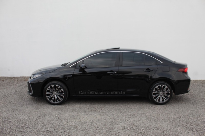COROLLA 1.8 ALTIS PREMIUM 16V HÍBRIDO 4P AUTOMÁTICO - 2021 - FLORES DA CUNHA