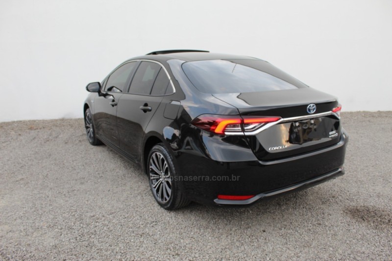 COROLLA 1.8 ALTIS PREMIUM 16V HÍBRIDO 4P AUTOMÁTICO - 2021 - FLORES DA CUNHA