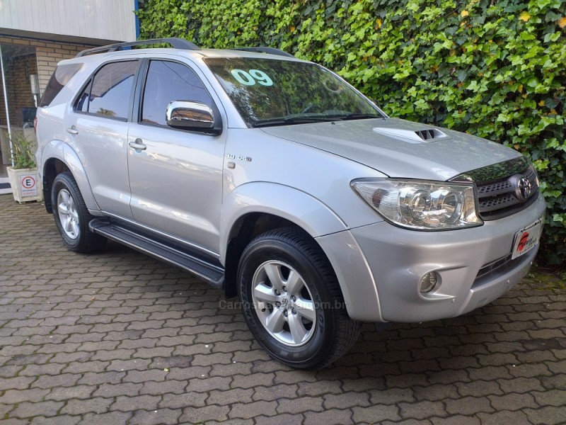 HILUX SW4 3.0 SRV 4X4 7 LUGARES 16V TURBO INTERCOOLER DIESEL 4P AUTOMÁTICO - 2009 - CAXIAS DO SUL