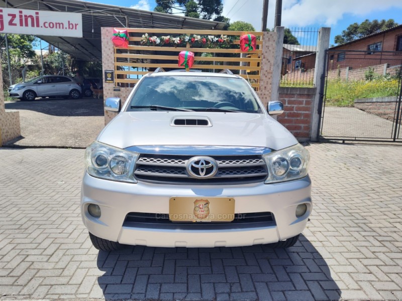 HILUX SW4 3.0 SRV 4X4 7 LUGARES 16V TURBO INTERCOOLER DIESEL 4P AUTOMÁTICO - 2011 - CANELA