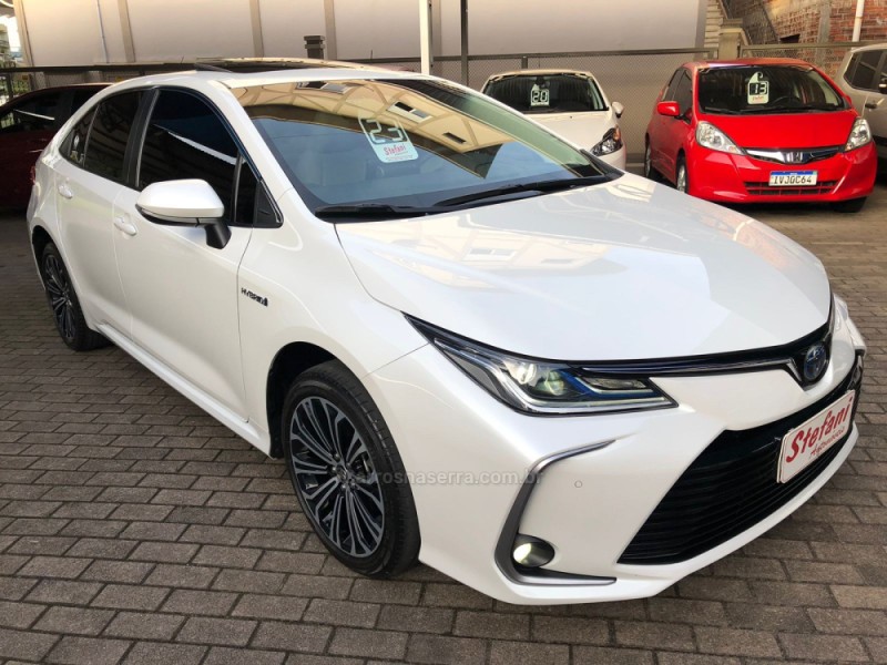 COROLLA 1.8 ALTIS PREMIUM 16V HÍBRIDO 4P AUTOMÁTICO - 2023 - FELIZ