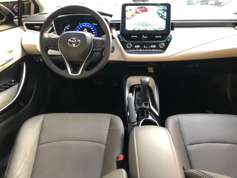 COROLLA 1.8 ALTIS PREMIUM 16V HÍBRIDO 4P AUTOMÁTICO - 2023 - FELIZ