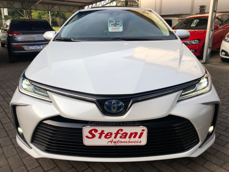 COROLLA 1.8 ALTIS PREMIUM 16V HÍBRIDO 4P AUTOMÁTICO - 2023 - FELIZ